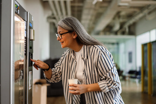 Sustainable Office Solutions: The Environmental Benefits of Using Water Coolers and Vending Machines
